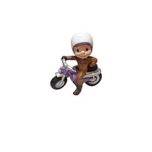 boy mac riding on motorcycle